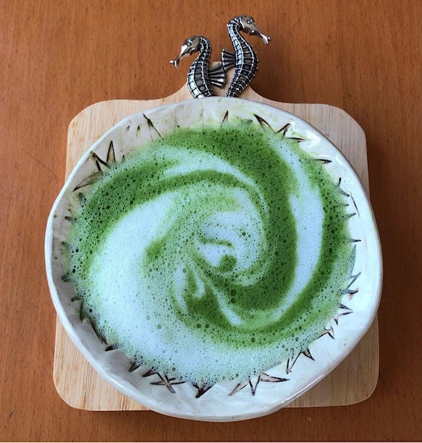 matcha latte with frothed milk
