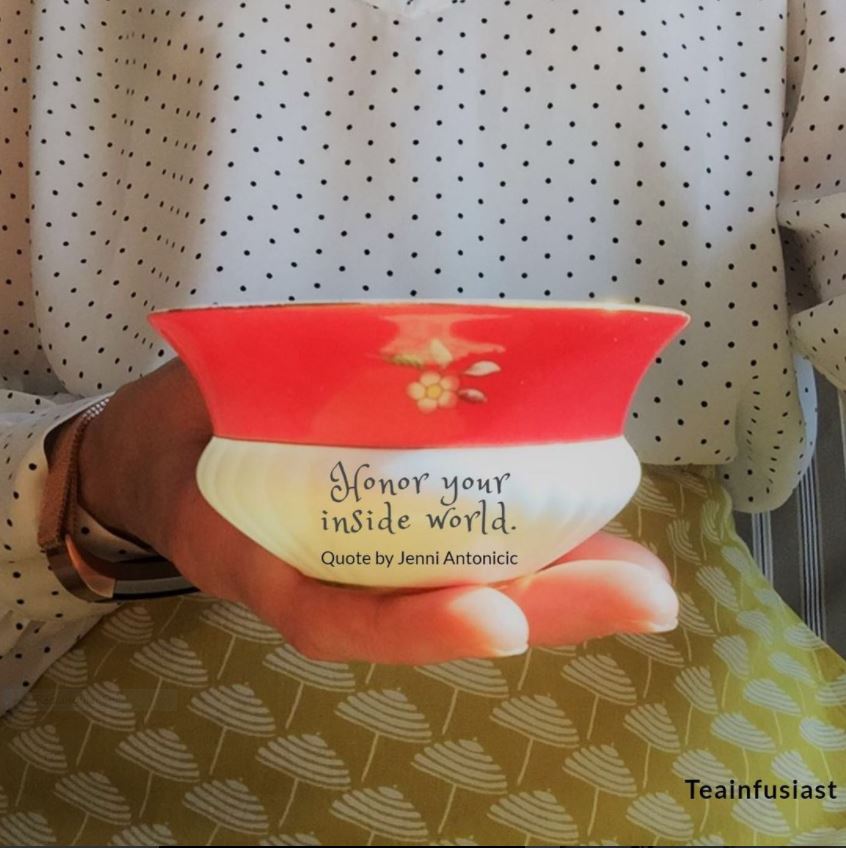 MoTEAvational quote by Jenni Antonicic on the outside of a teacup held in a woman's hand. The quote reads "Honor your inside world."