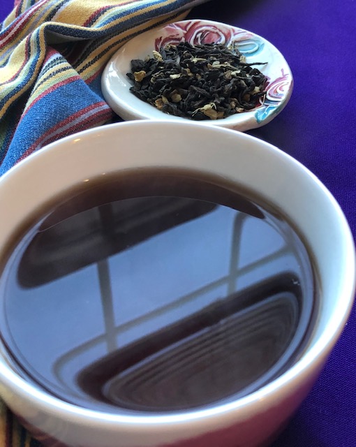 Blood Orange Pu-erh tea blend and steeped tea