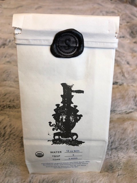 Bag of tea sealed with black wax from Samovar Tea