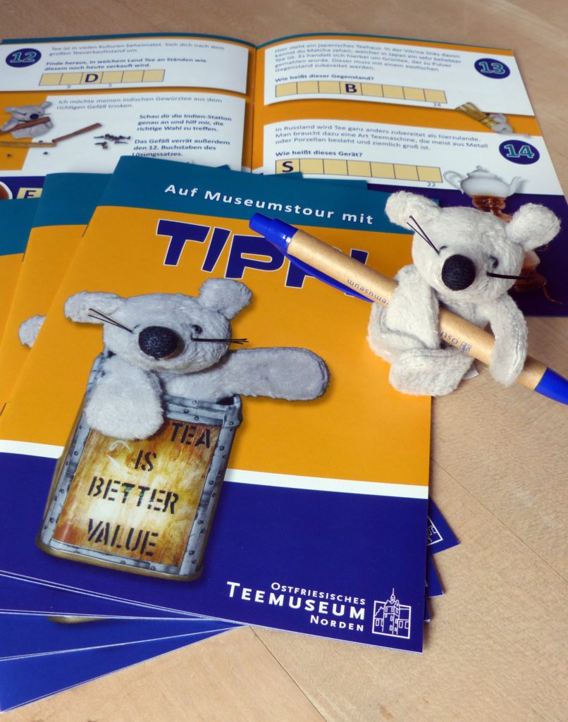 Stuffed animal and booklet with Tippi the Tea Mouse from the East Frisian Tea Museum