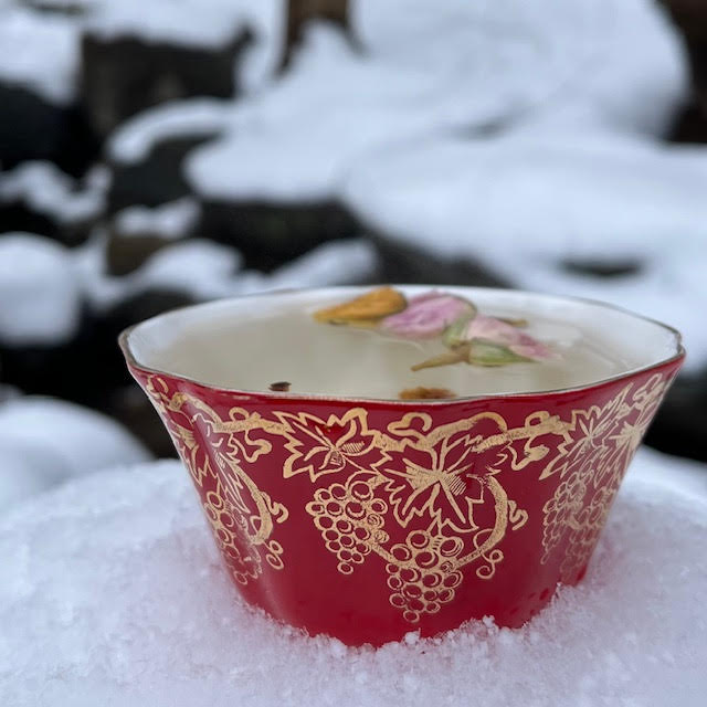 March 2024 edition of Tea Infusiast News features red and gold Royal Grafton sugar bowl being used as a teacup.