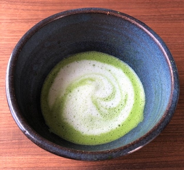 swirled bowl of matcha latte