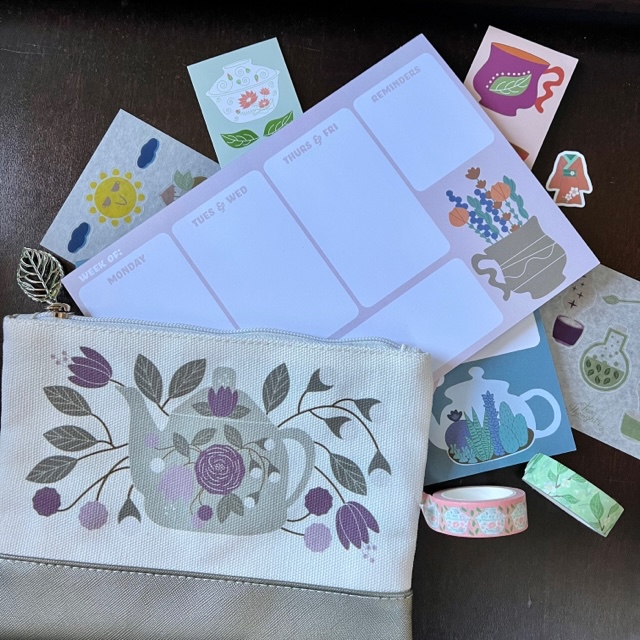 This photo shows an assortment of gifts this tea lover has bought from Tea Thoughts--stationery, washi tape, book mores, a zipper pouch, and more.