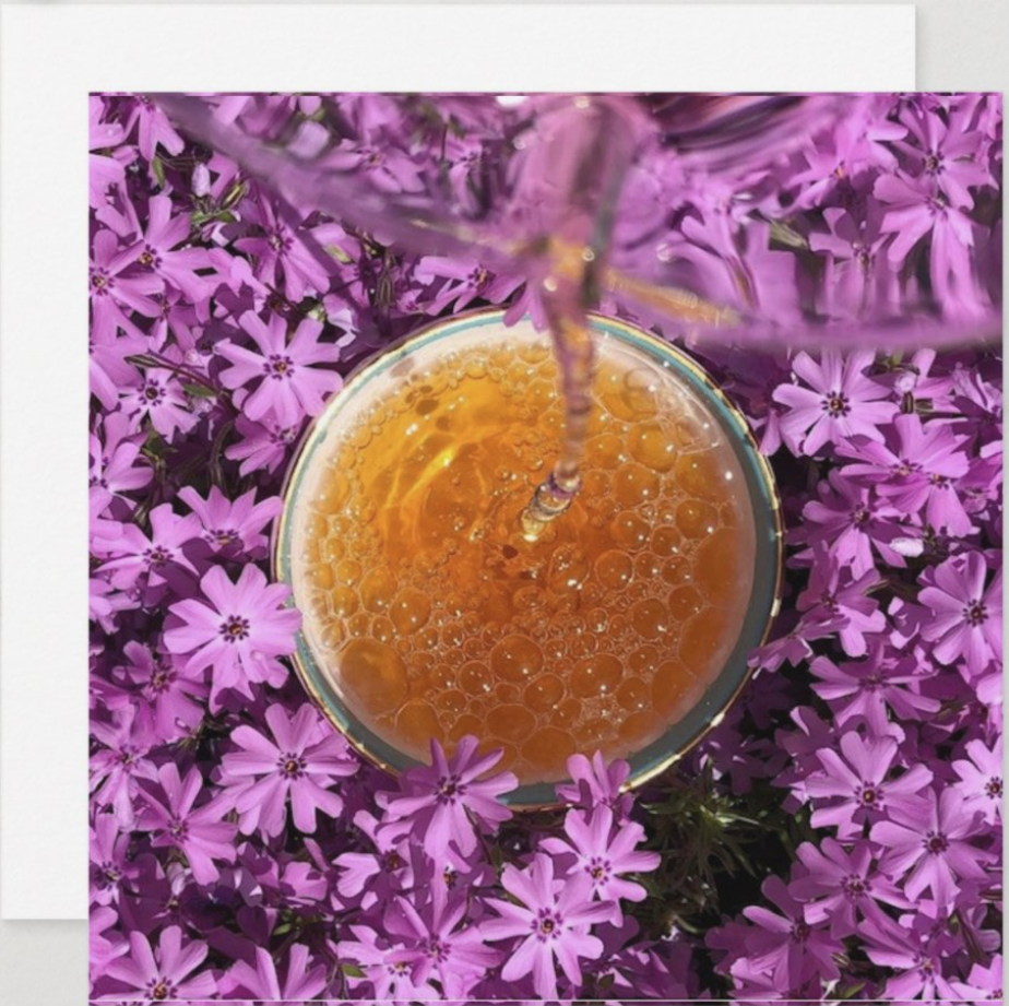 Tea pouring into a porcelain teacup surrounded by pink Phlox flowers. One of Tea Infusiast's Spring Celebration Cards.
