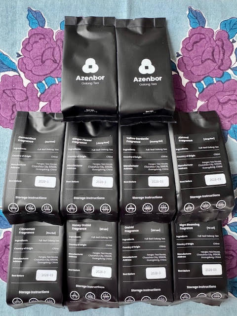 10 Azenbor Phoenix Dan Cong tea samples in black blacks with white writing