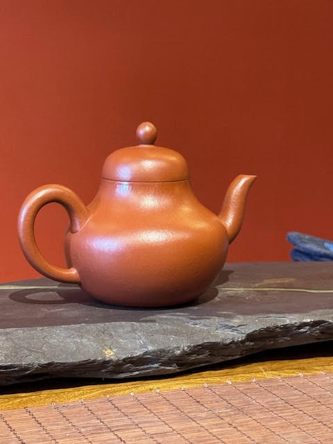 Clay pear shaped teapot on a piece of slate at Jin Yun Fu Tea Shop in NYC
