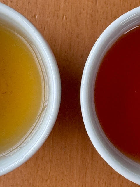 Steeped green rooibos on the left; steeped rooibos tea on the right